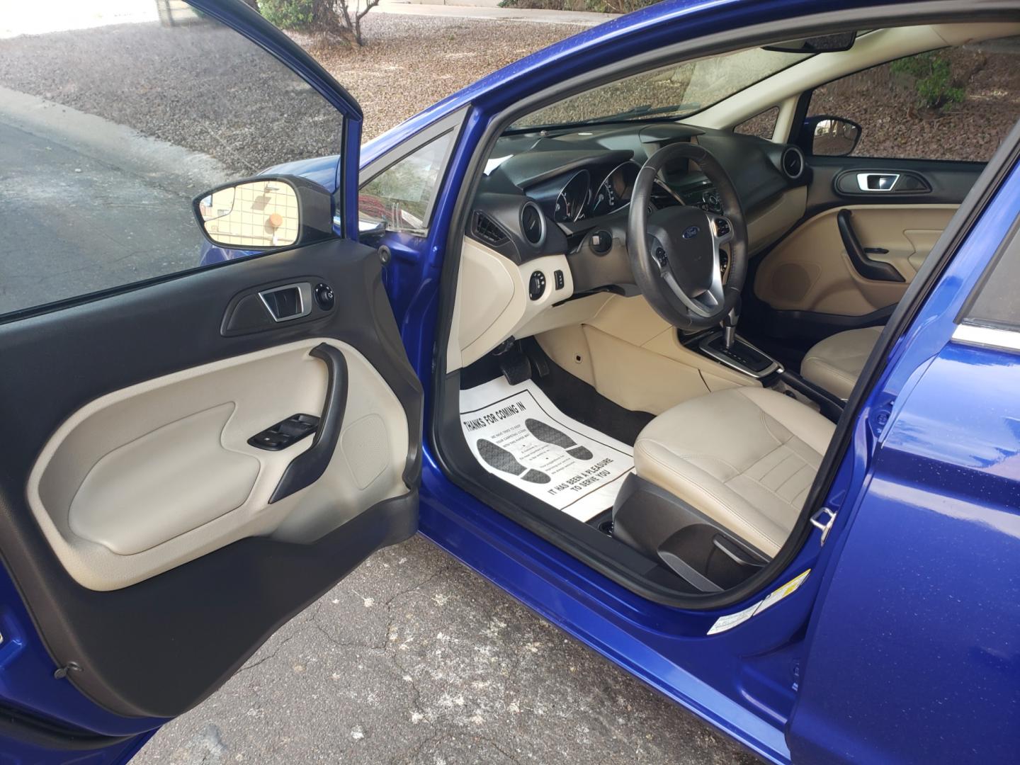 2014 /Tan and black Ford Fiesta Titanium (3FADP4FJ5EM) with an 1.6l i4 engine, 6-Speed Automatic transmission, located at 323 E Dunlap Ave., Phoenix, AZ, 85020, (602) 331-9000, 33.567677, -112.069000 - 2014 Ford Fiesta Titanium,.......A Must See!!... No accidents, Only 95K MILES.... Ice cold AC. The car is gorgeous inside and out. Power windows, Power door locks, Touch screen Stereo/ CD Player, Phone sync, Bluetooth, Satellite compatible, Backup camera, Beautiful tan and black interior with tan le - Photo#8